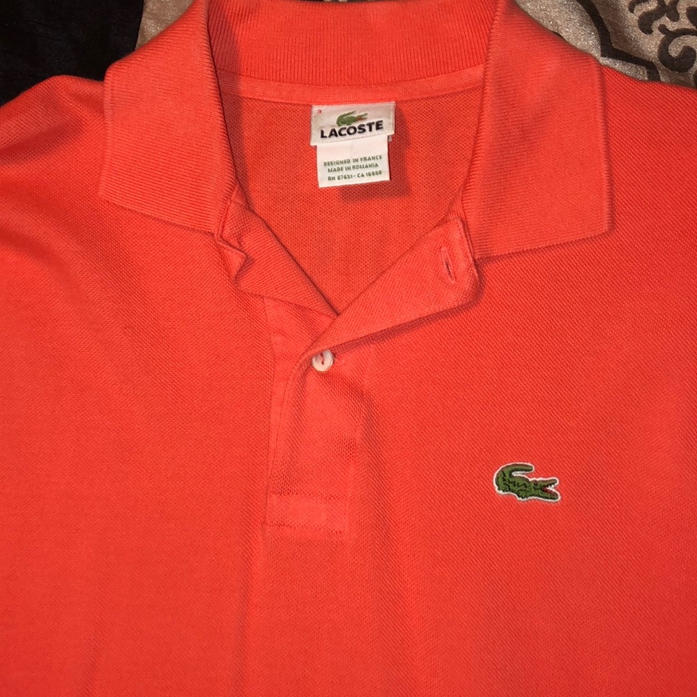 Orange Lacoste men’s polo shirt size S